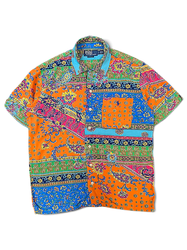 JAKE & IPI short-sleeve polo shirt featuring a vibrant multicolor paisley and floral patchwork print