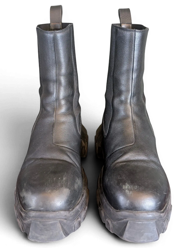 JAKE & IPI Rick Owens Beatle Bozo Tractor boots in metallic black leather with an oversized lug sole.