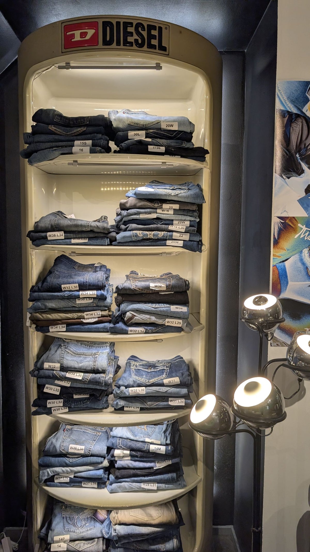 Diesel denim cabinet with folded jeans at JAKE & IPI
