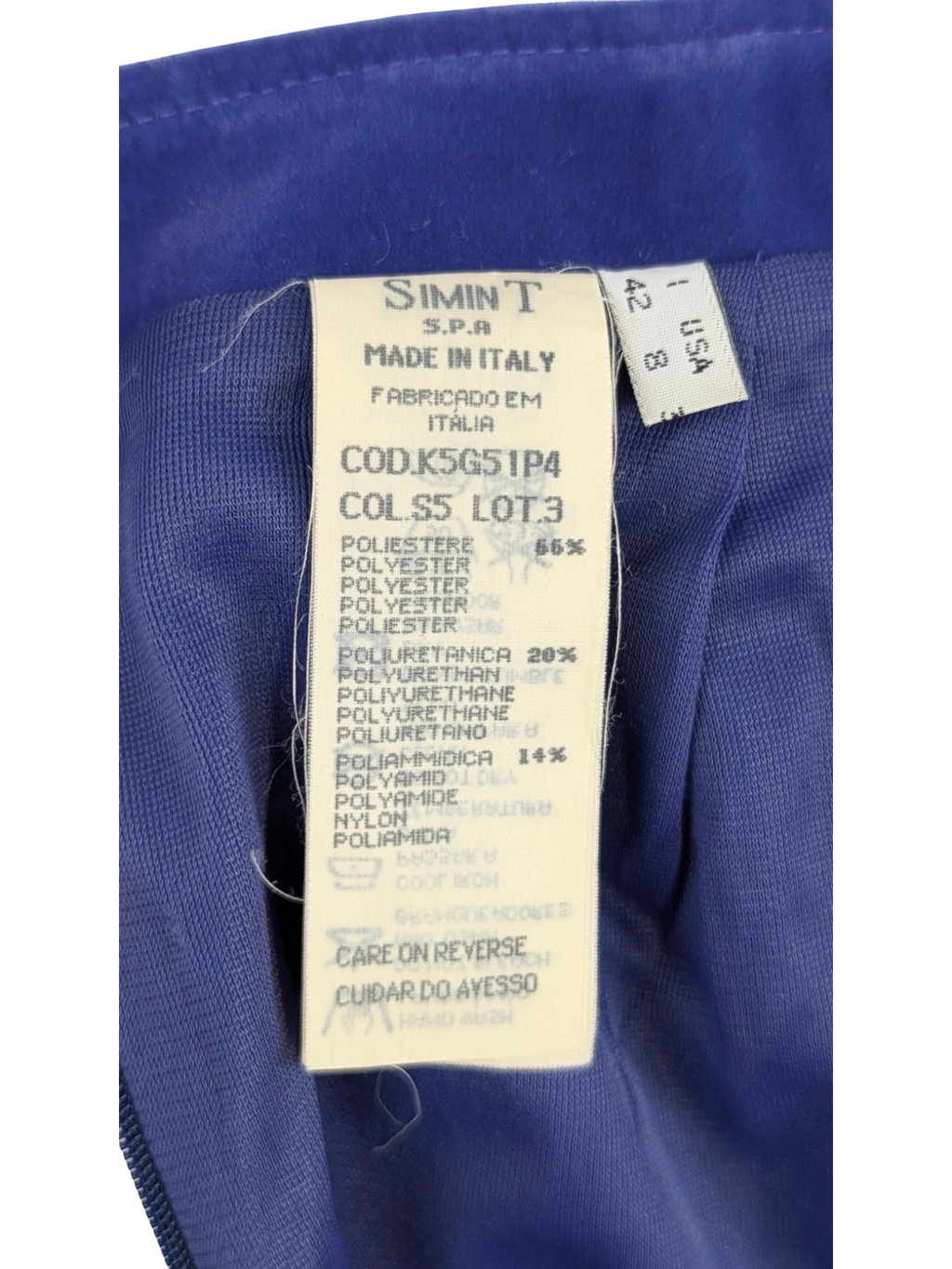 Vintage Armani Jeans cobalt blue mini skirt, A-line silhouette, back zip, patch pocket detail. Made in Italy.