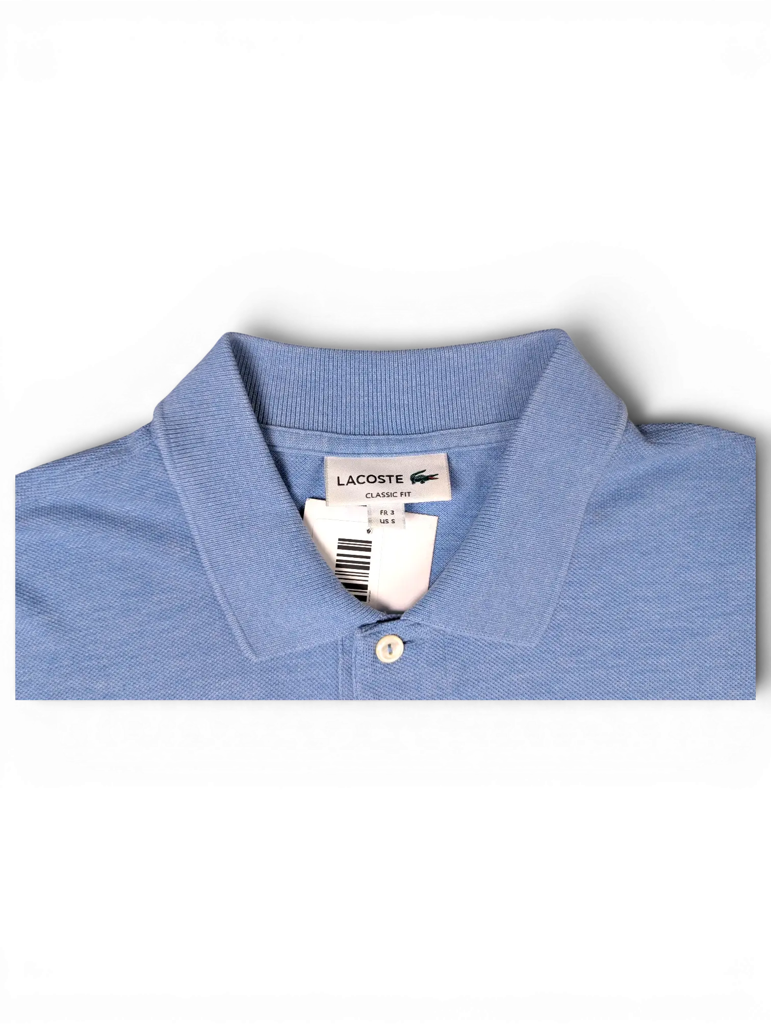Collar and brand label detail of Lacoste Light Blue Polo Shirt