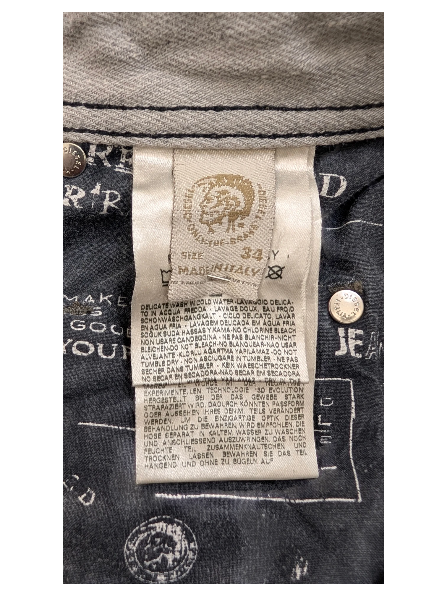 Diesel Krooley W34 L34 jeans, size 34x34, made in Italy. Grey denim with black stitching and branded buttons.