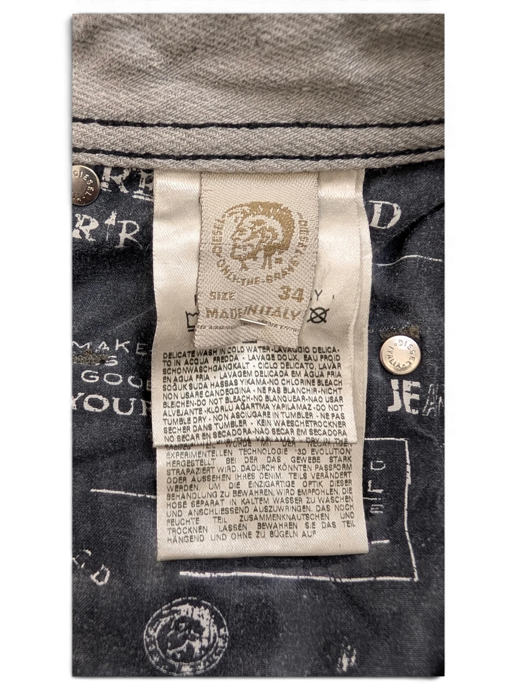 Diesel Krooley W34 L34 jeans, size 34x34, made in Italy. Grey denim with black stitching and branded buttons.