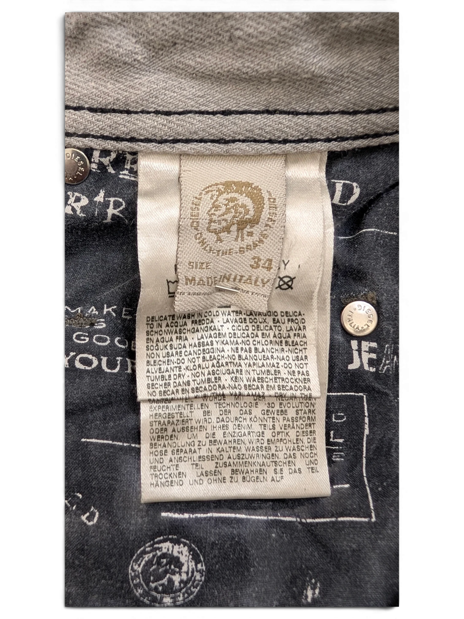 Diesel Krooley W34 L34 jeans, size 34x34, made in Italy. Grey denim with black stitching and branded buttons.