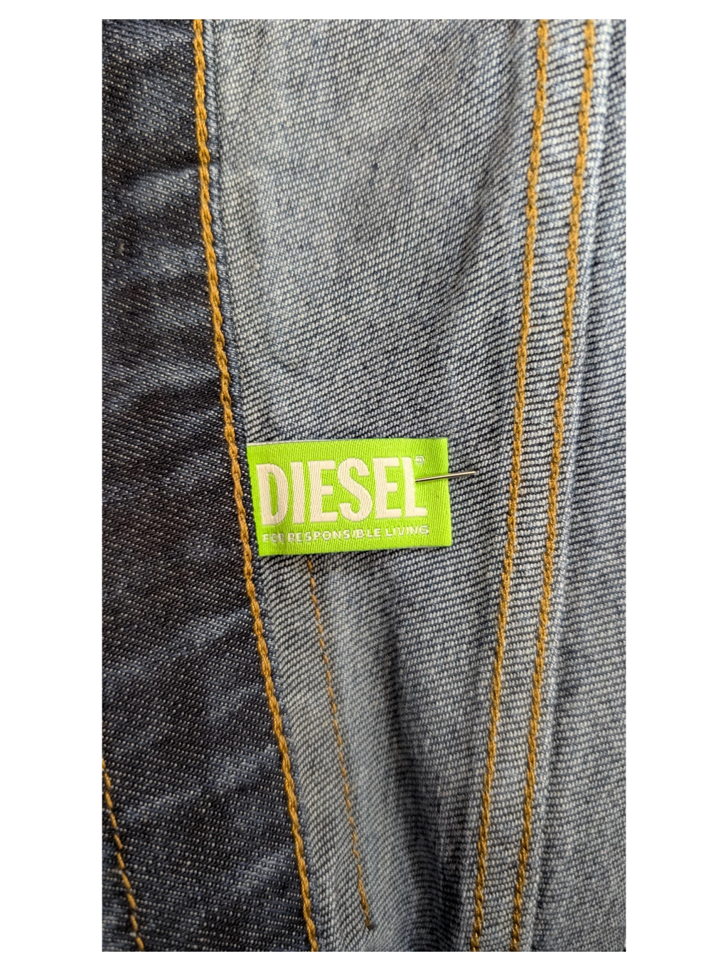 Diesel D-Fining jeans in blue denim with contrast stitching and a neon green DIESEL label.