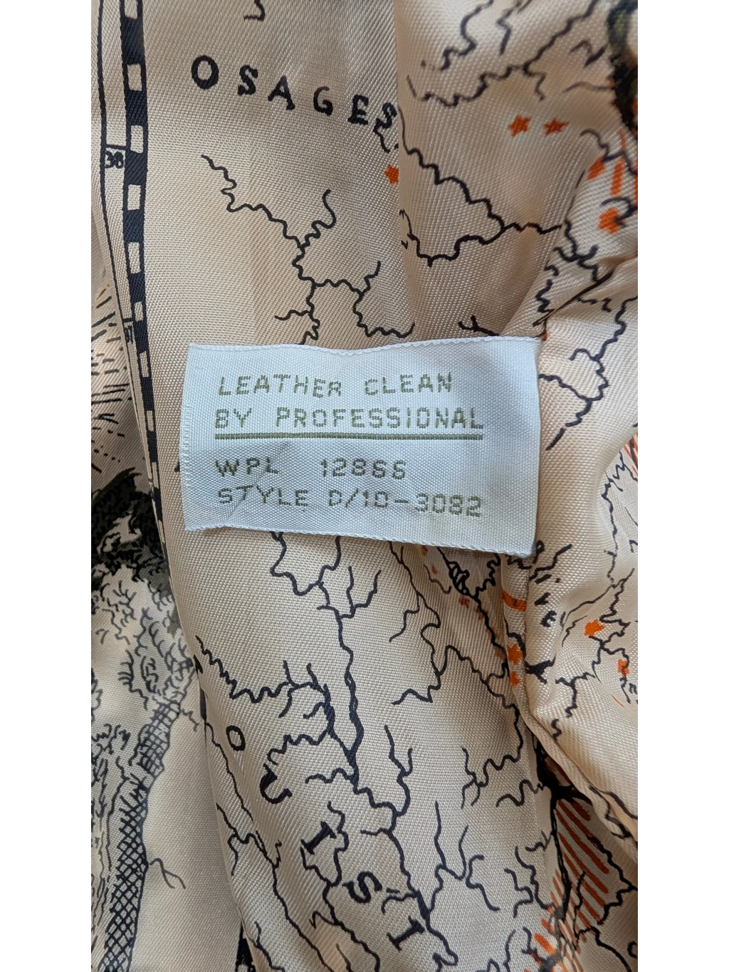 JAKE & IPI American Weekend leather jacket lining with map print. Professional leather clean tag.