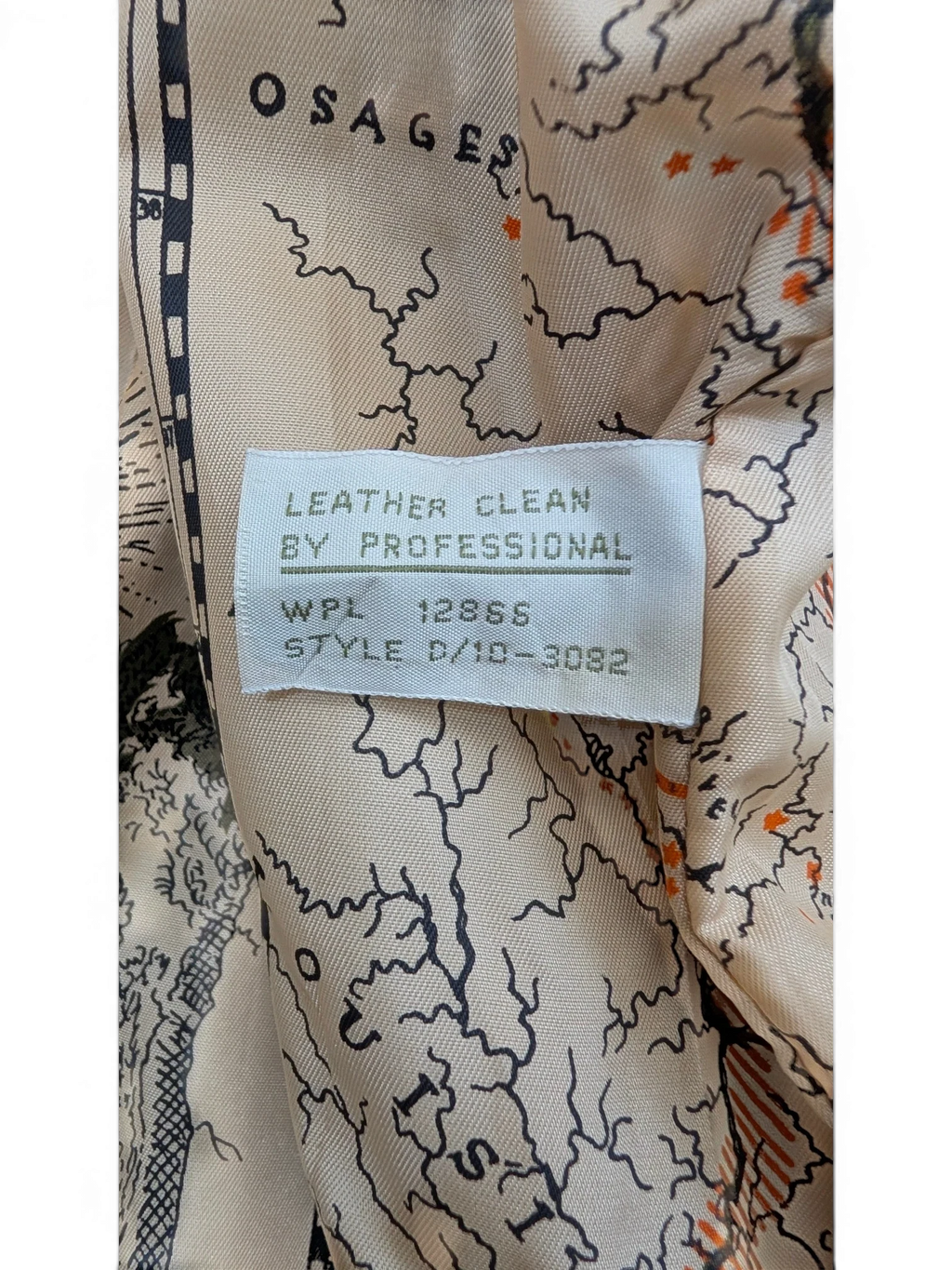JAKE & IPI American Weekend leather jacket lining with map print. Professional leather clean tag.