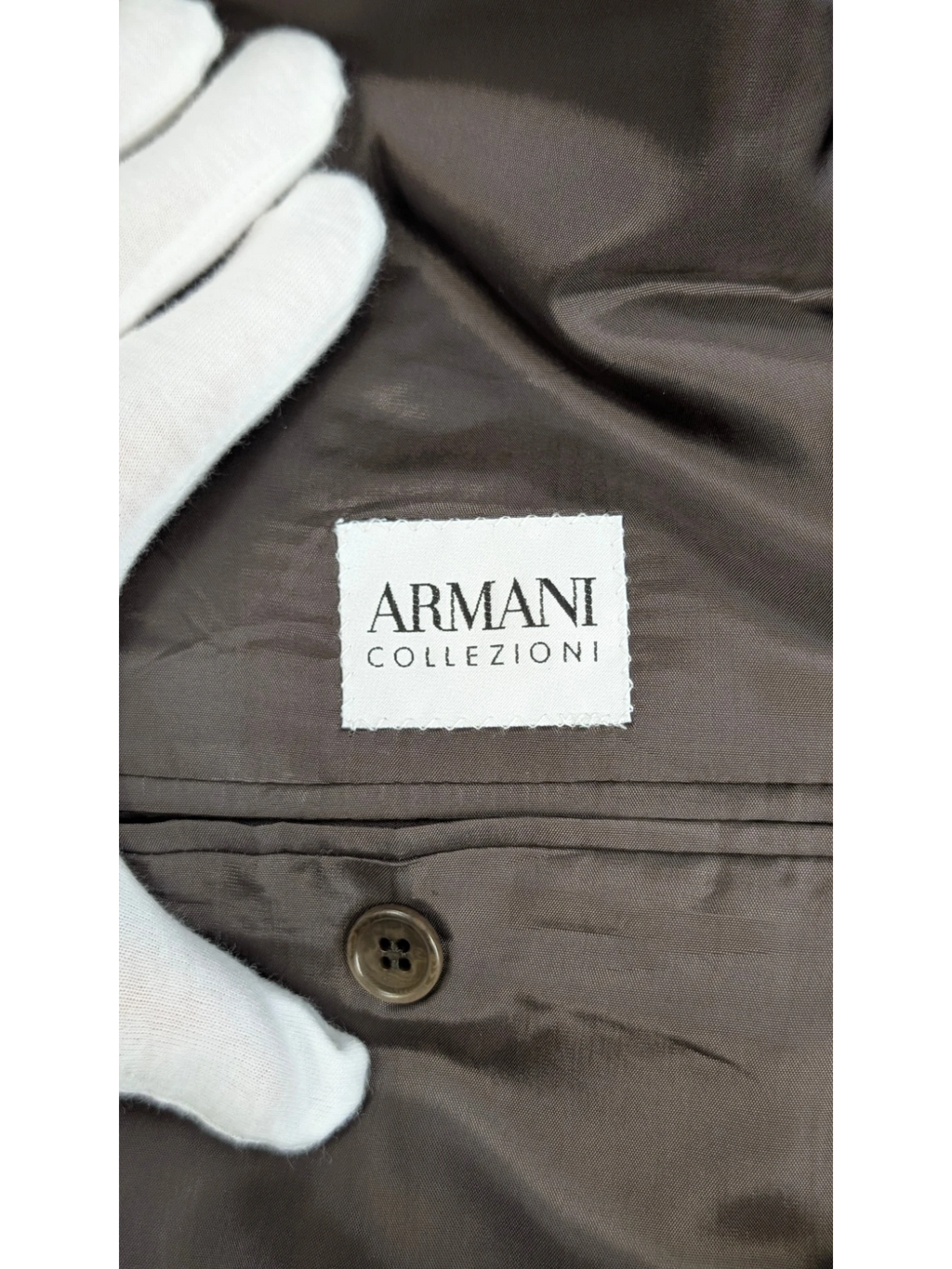 Armani Collezioni charcoal grey wool pinstripe blazer, size 52 EU. Features notched lapel, two-button closure, and viscose lining.