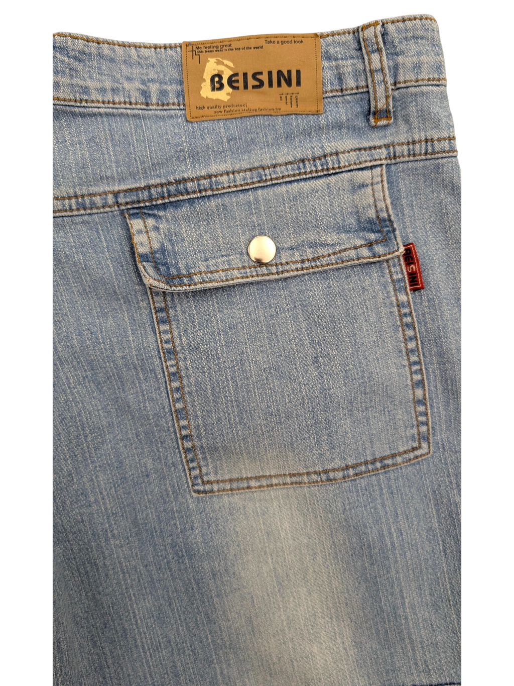 JAKE & IPI Beisini light wash denim cargo jeans with buttoned pocket and red logo tag.