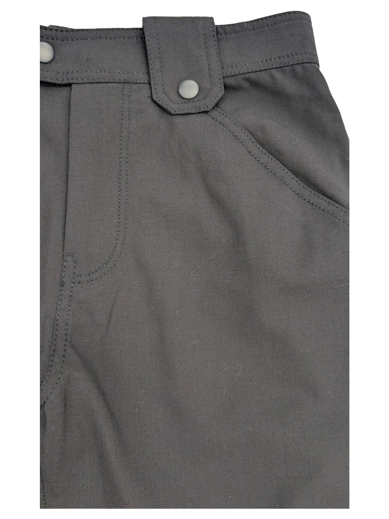 JAKE & IPI black cargo pants with button closure and angled pockets.