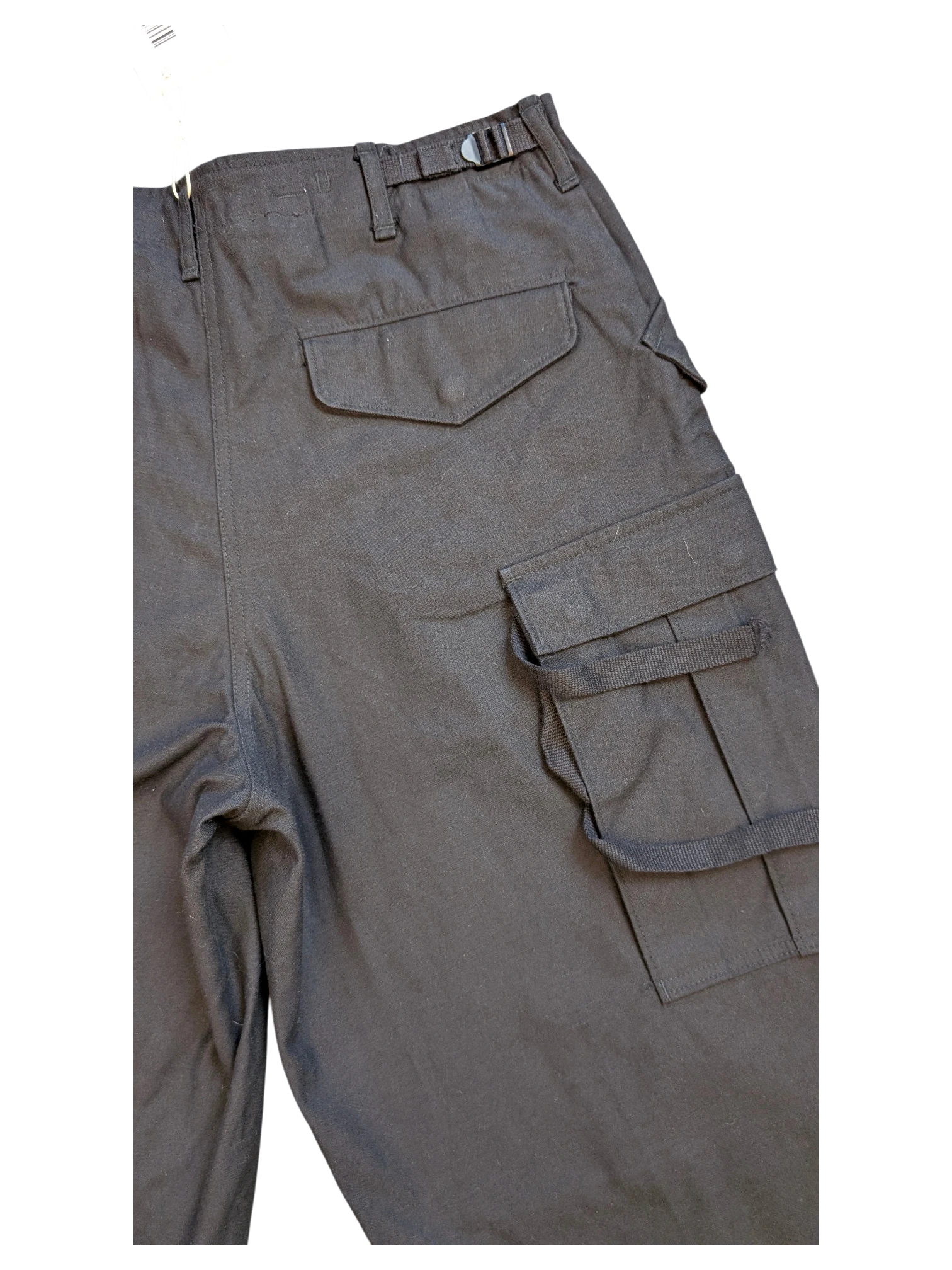 JAKE & IPI black cotton cargo pants with adjustable waist buckle and multiple pockets.