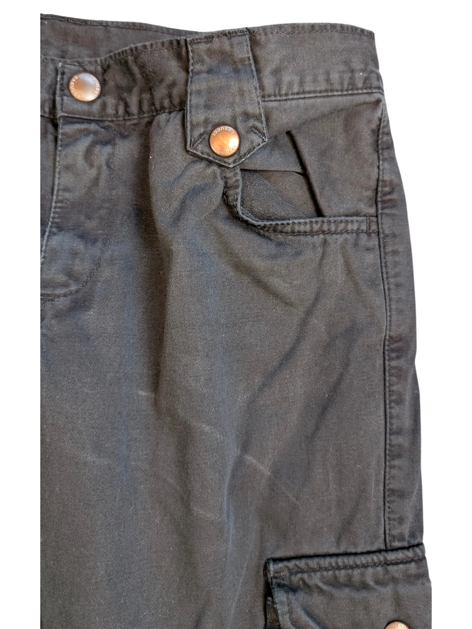 JAKE & IPI black cotton cargo pants with copper button details and multiple pockets.