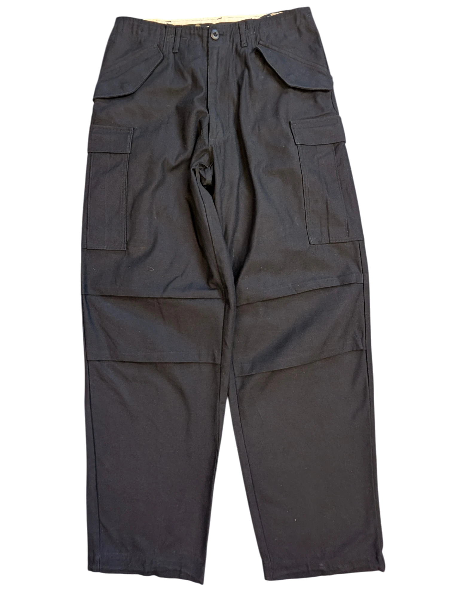 JAKE & IPI black cotton cargo pants with multiple pockets and reinforced knees.