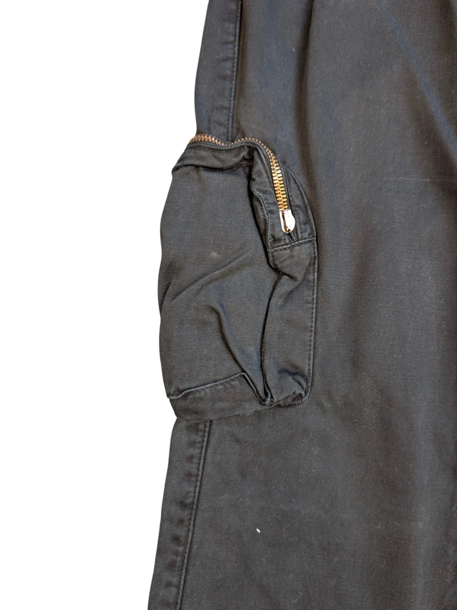 JAKE & IPI black cargo pants with zippered pocket detail. Cotton blend.