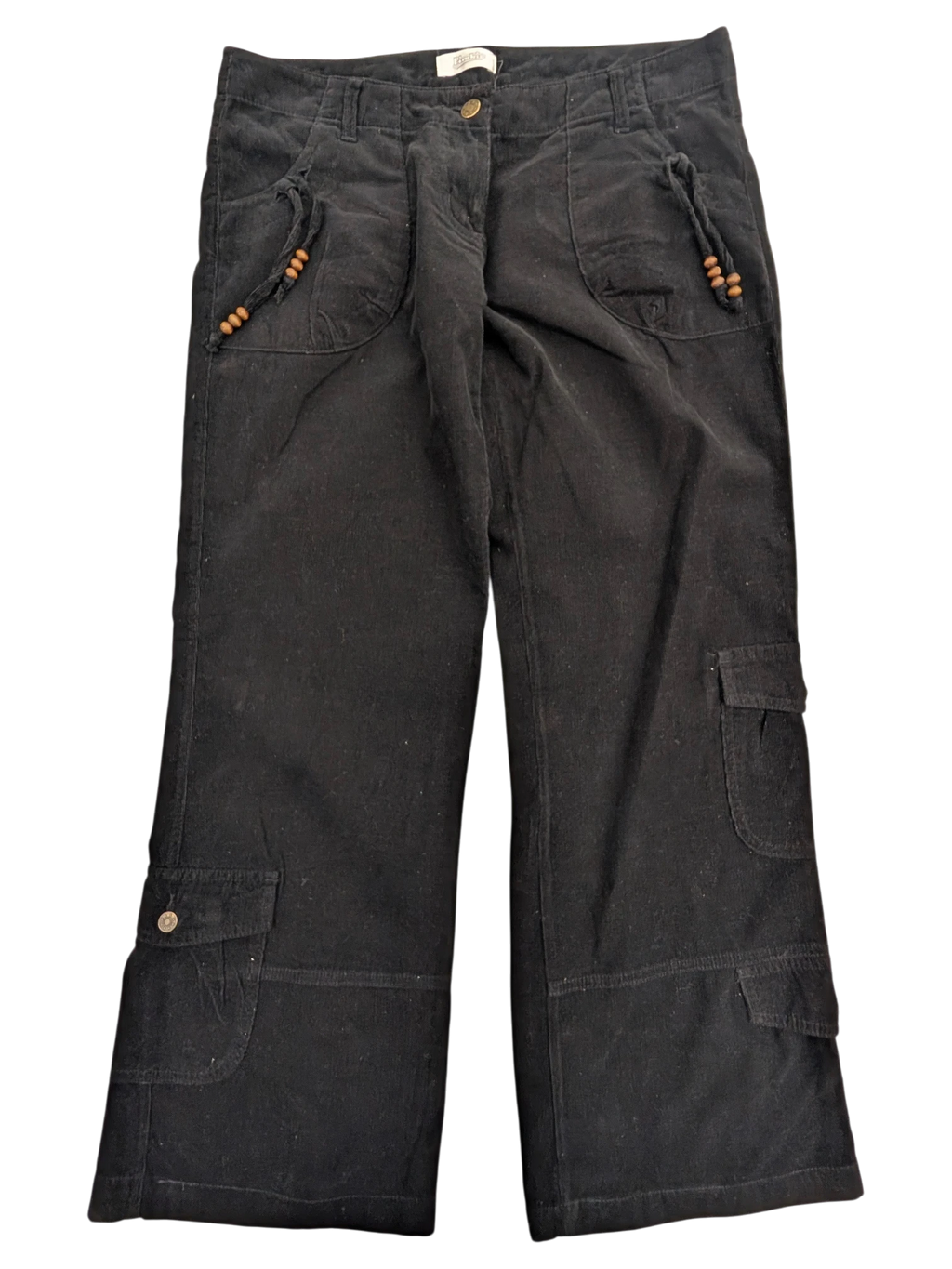 JAKE & IPI black corduroy cargo pants with wooden bead drawstring detail on pockets and button closure.