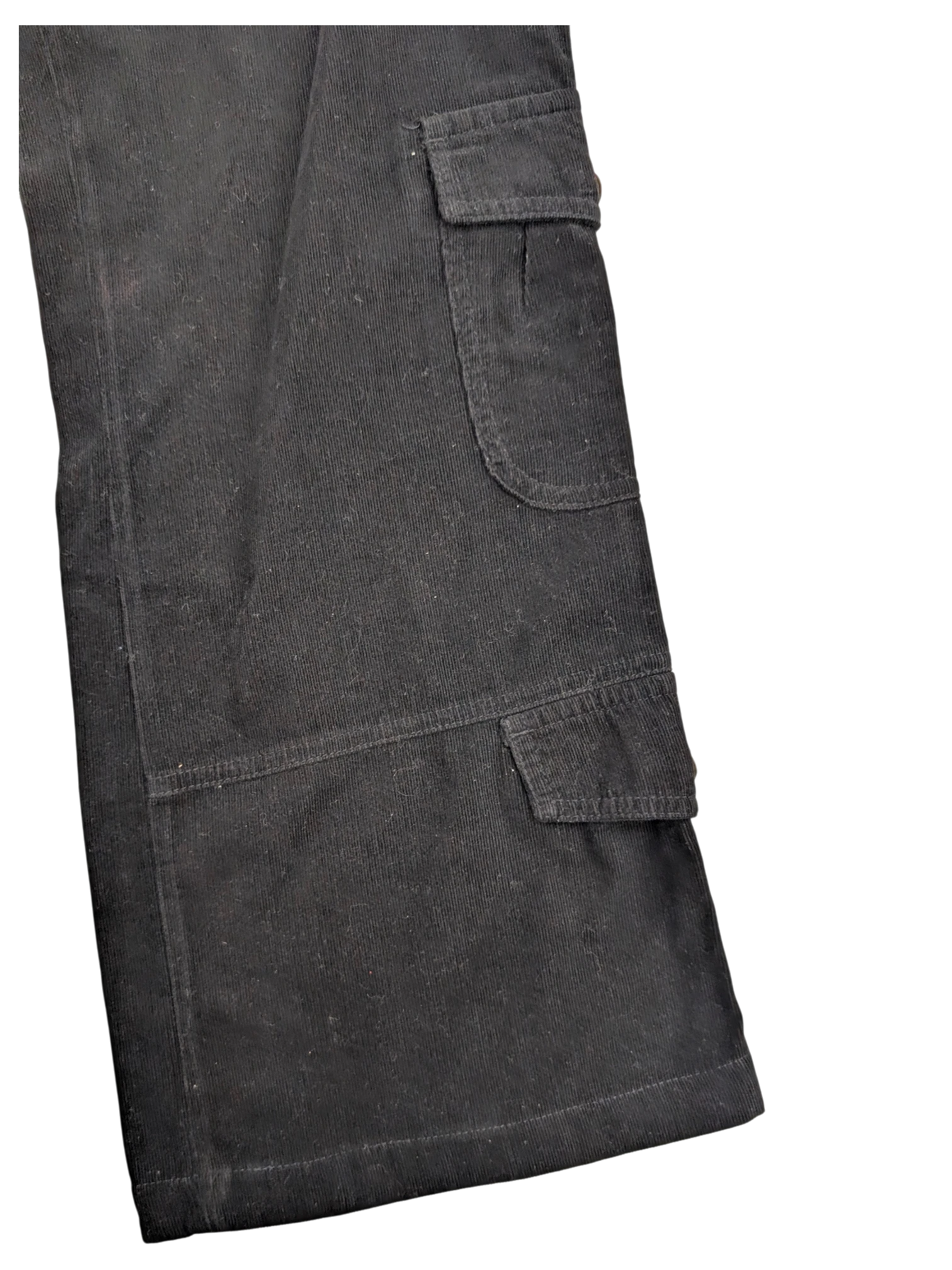 JAKE & IPI black corduroy cargo pants with button flap pockets and visible stitching detail.