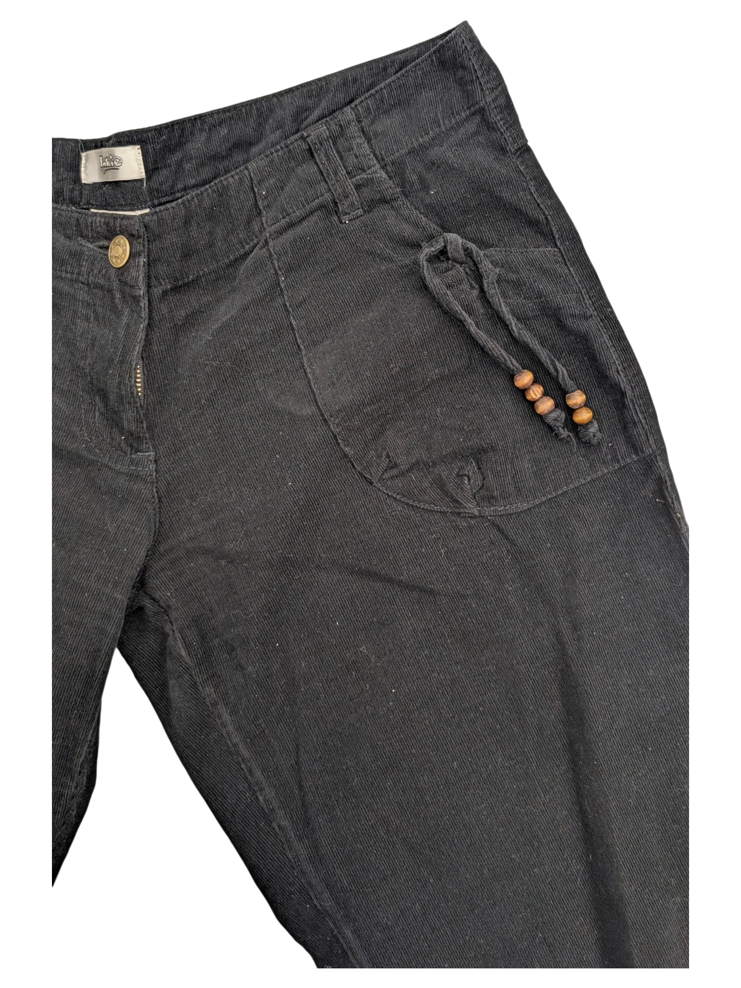 JAKE & IPI black corduroy cargo pants with drawstring detail and wooden beads on pocket.