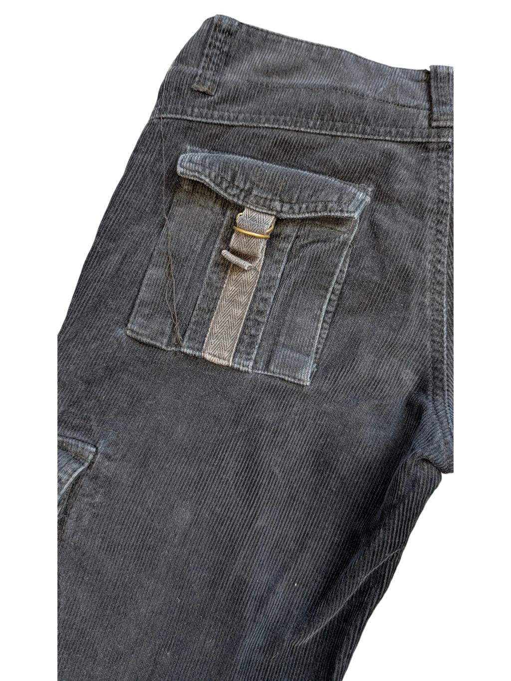 JAKE & IPI black corduroy cargo pants with a buttoned flap pocket and herringbone trim detail.