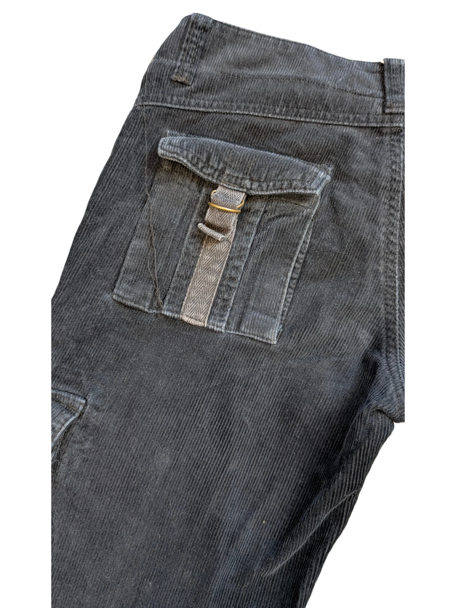 JAKE & IPI black corduroy cargo pants with a buttoned flap pocket and herringbone trim detail.