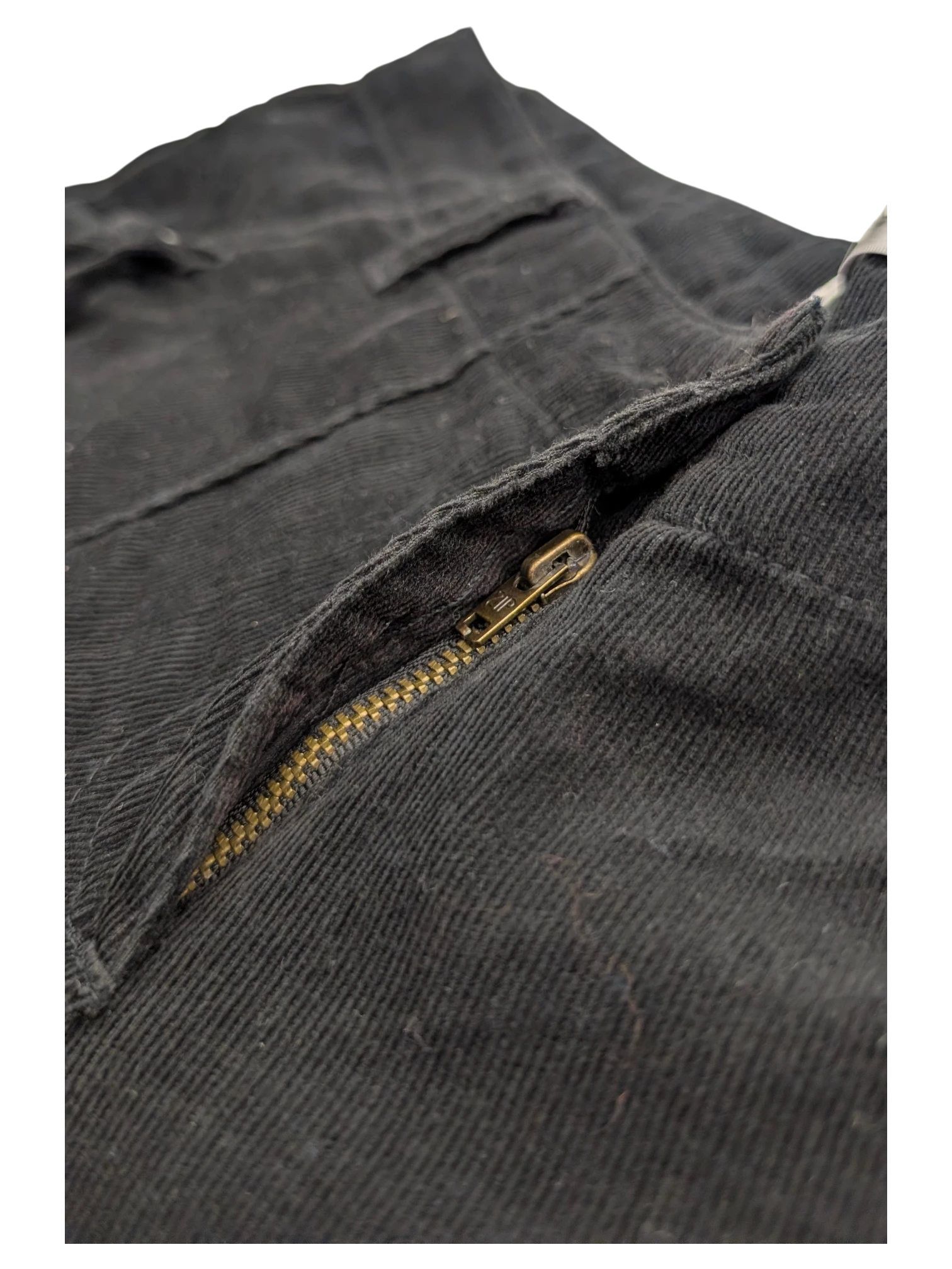 JAKE & IPI black corduroy cargo pants with brass zipper detail.