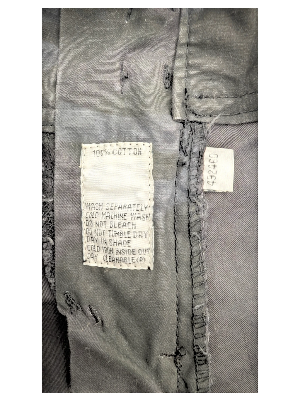 JAKE & IPI black 100% cotton cargo pants with care instructions tag.