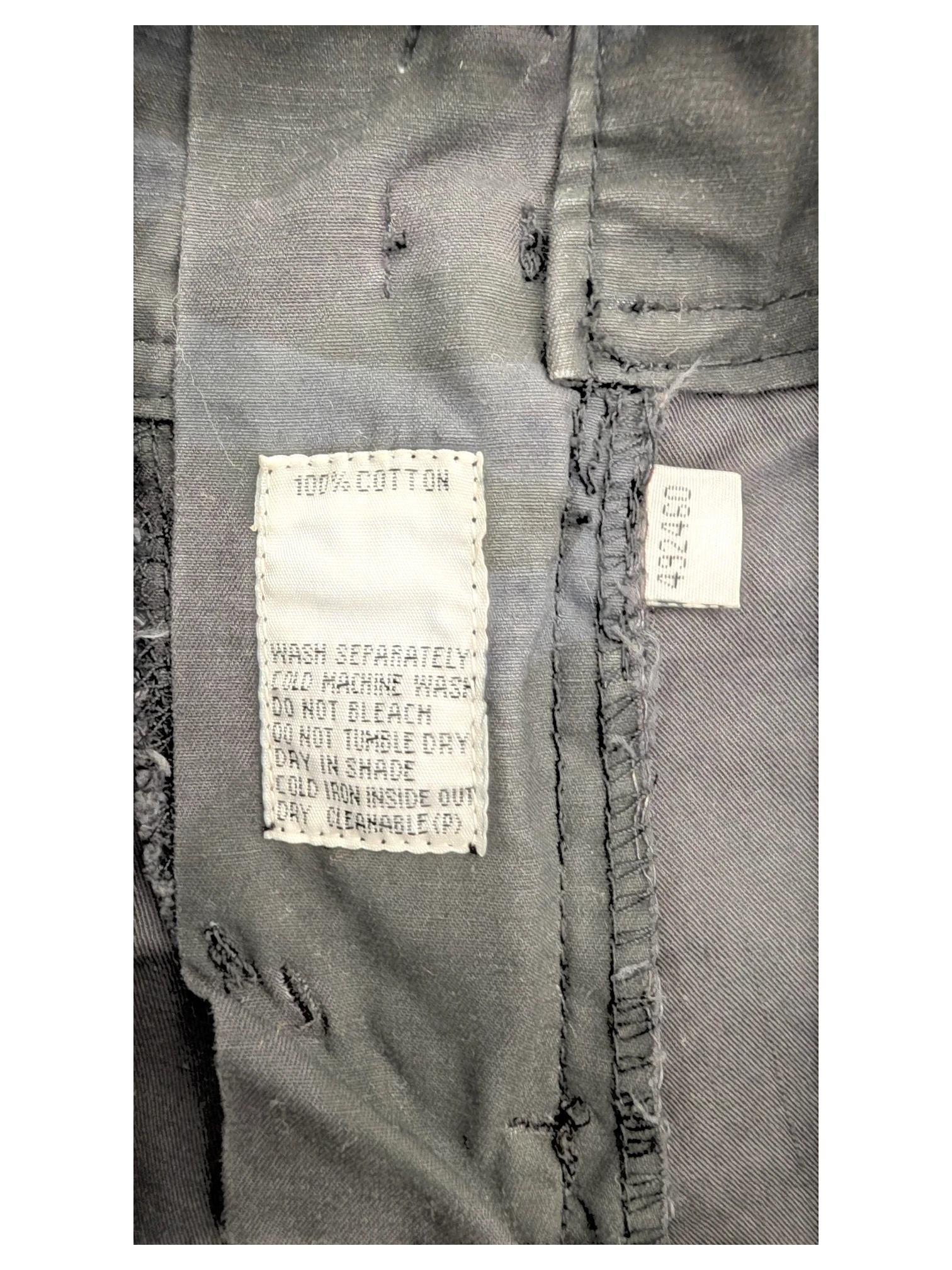 JAKE & IPI black 100% cotton cargo pants with care instructions tag.