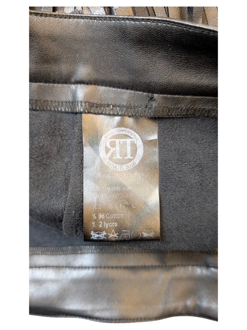 JAKE & IPI ROYAL TEMPTATION black cotton blend fringed mini skirt interior label showing fabric composition