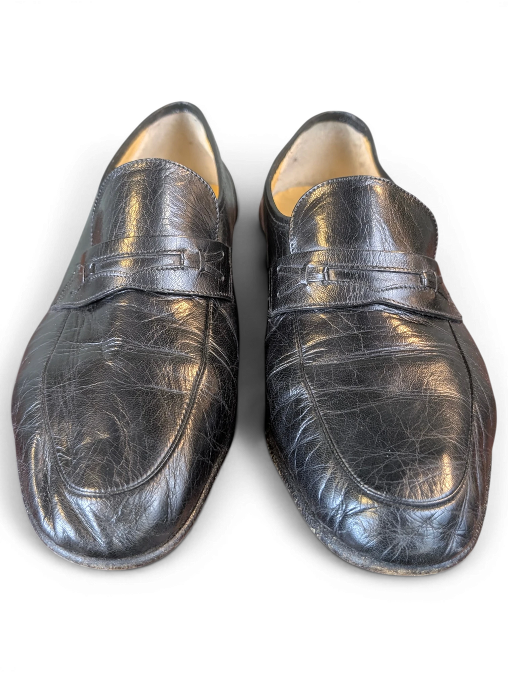 JAKE & IPI black leather penny loafers with a textured finish and classic slip-on design