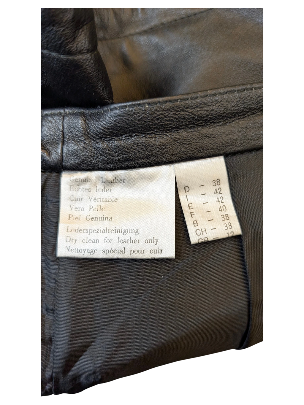 JAKE & IPI black genuine leather shorts care label and interior lining detail