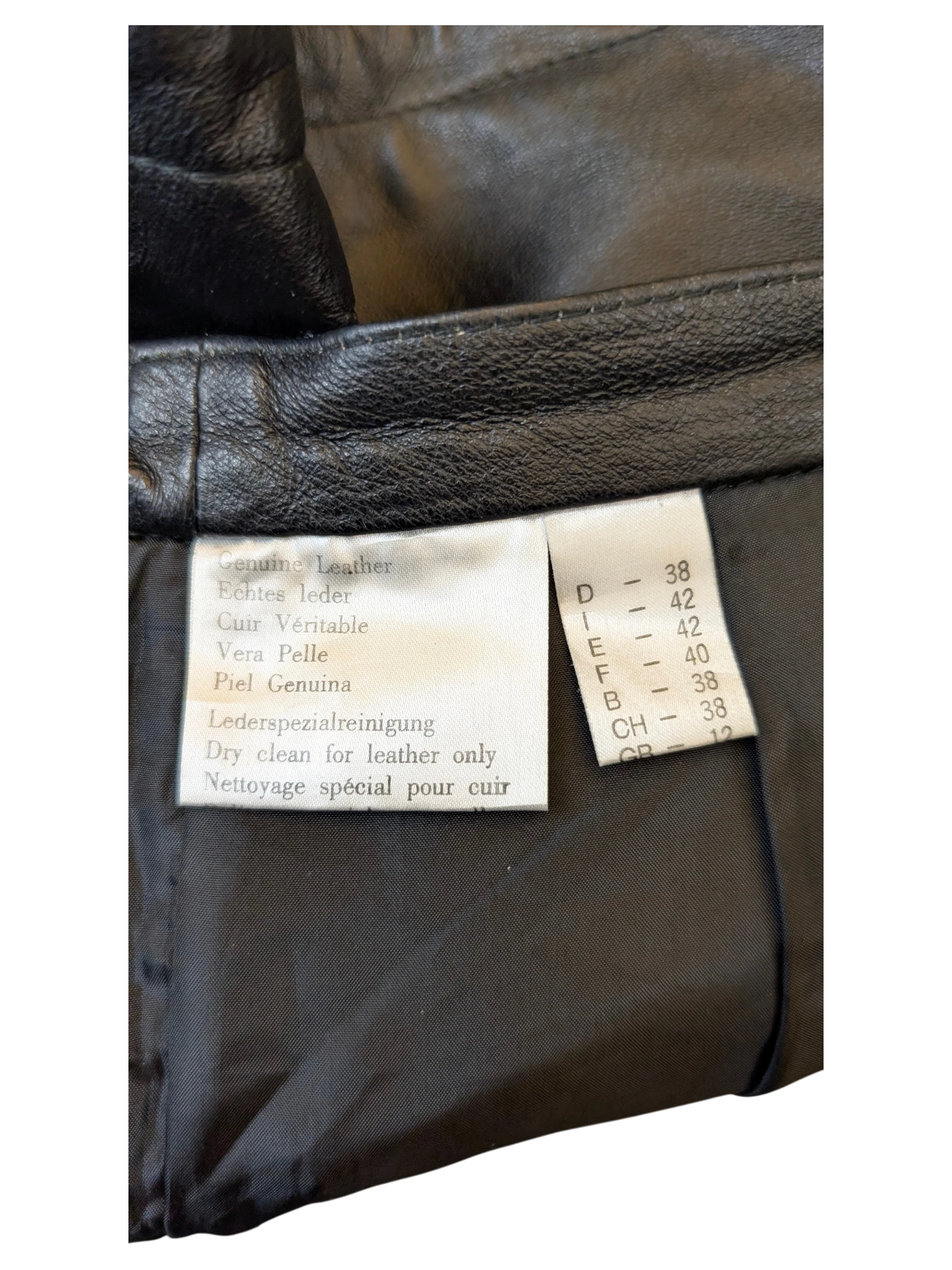 JAKE & IPI black genuine leather shorts care label and interior lining detail