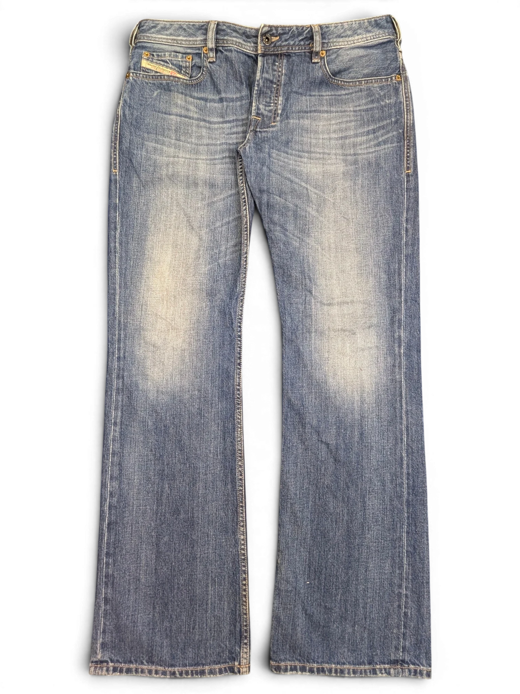 JAKE & IPI blue denim bootcut jeans with distressed detailing and button fly, size W34 L32.