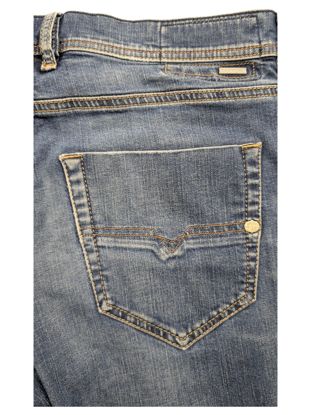 JAKE & IPI blue denim jeans with V-stitch back pocket detail and silver logo tab.