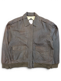 JAKE & IPI brown leather bomber jacket with button flap pockets and ribbed cuffs.