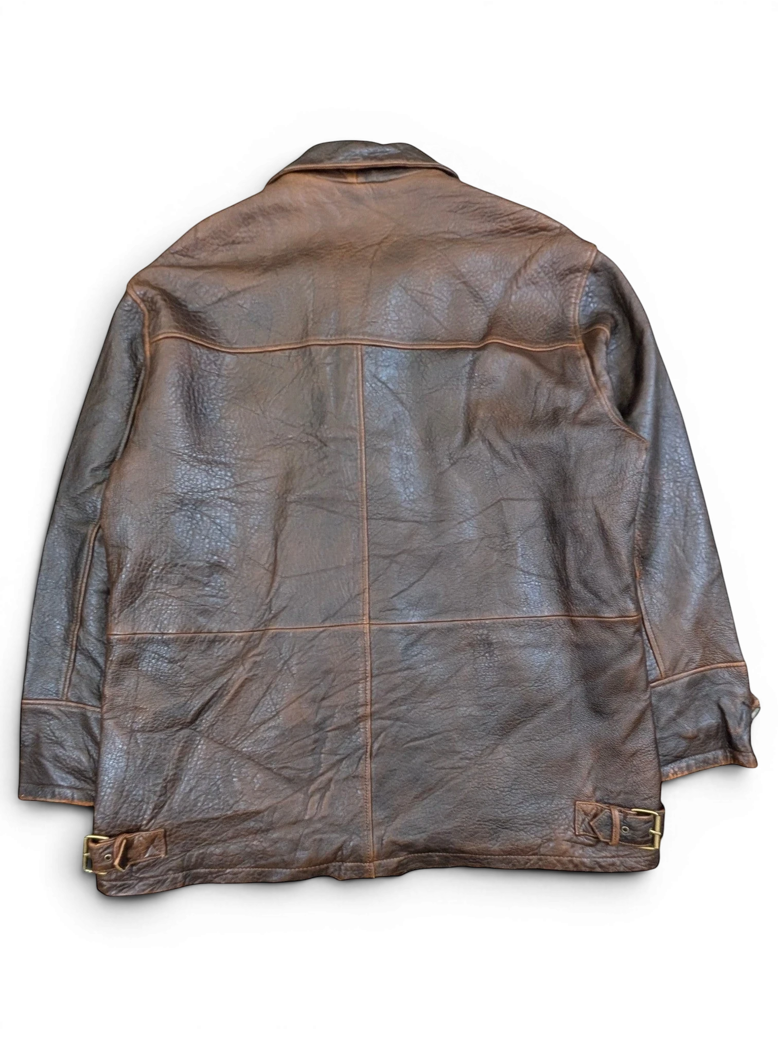 JAKE & IPI brown distressed leather jacket with buckle details on hem. Classic collar and panel stitching.