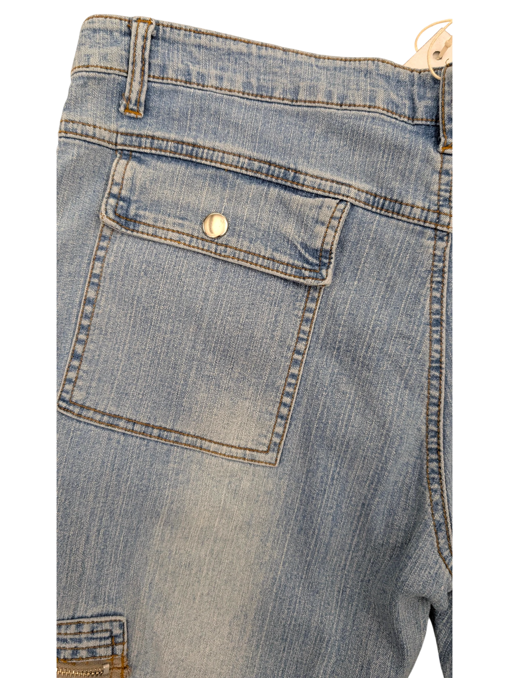 JAKE & IPI light wash denim cargo jeans with button flap pocket and zippered pocket detail.