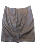 JAKE & IPI Carolina Herrera black leather skirt with a back zipper closure and a small hem vent.