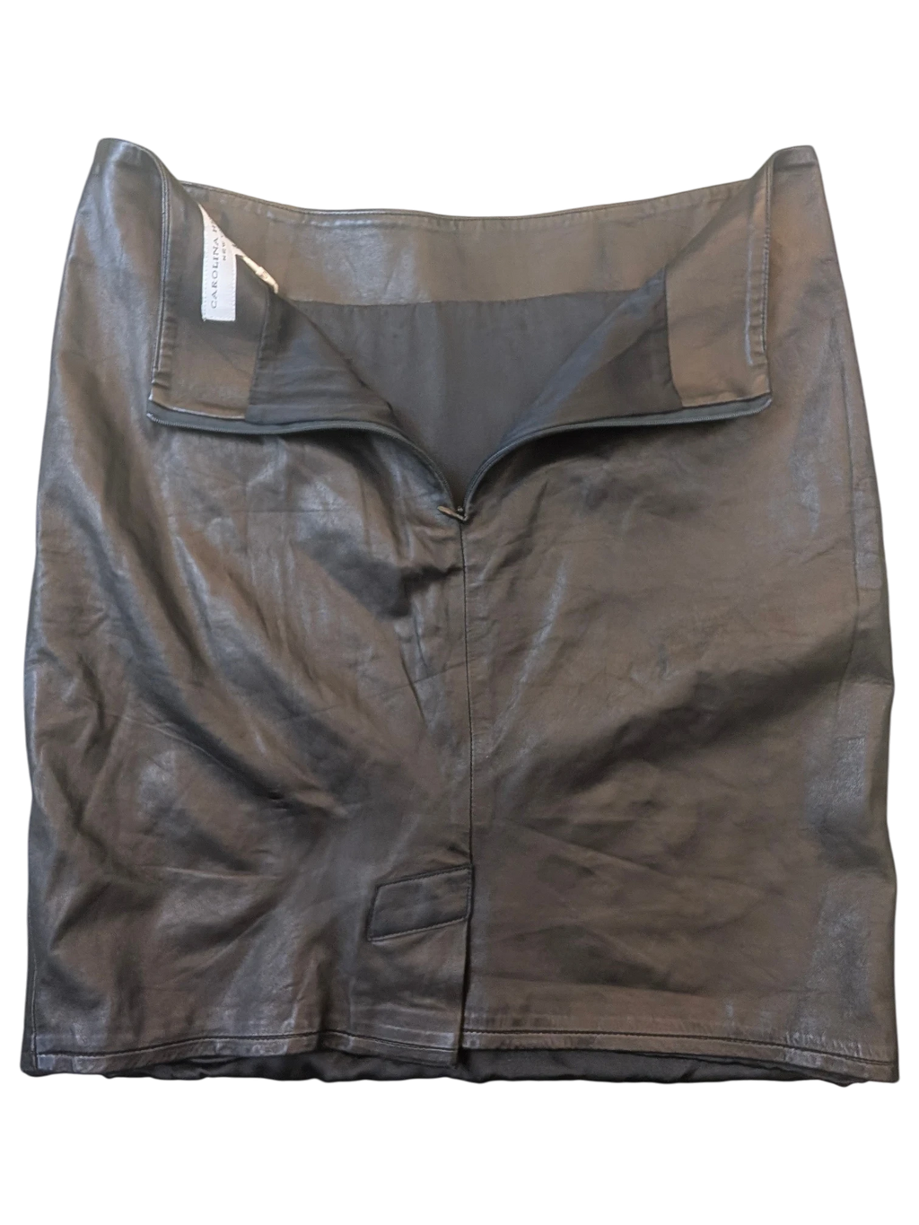 JAKE & IPI black Carolina Herrera leather mini skirt with a back zipper closure and structured waistband.