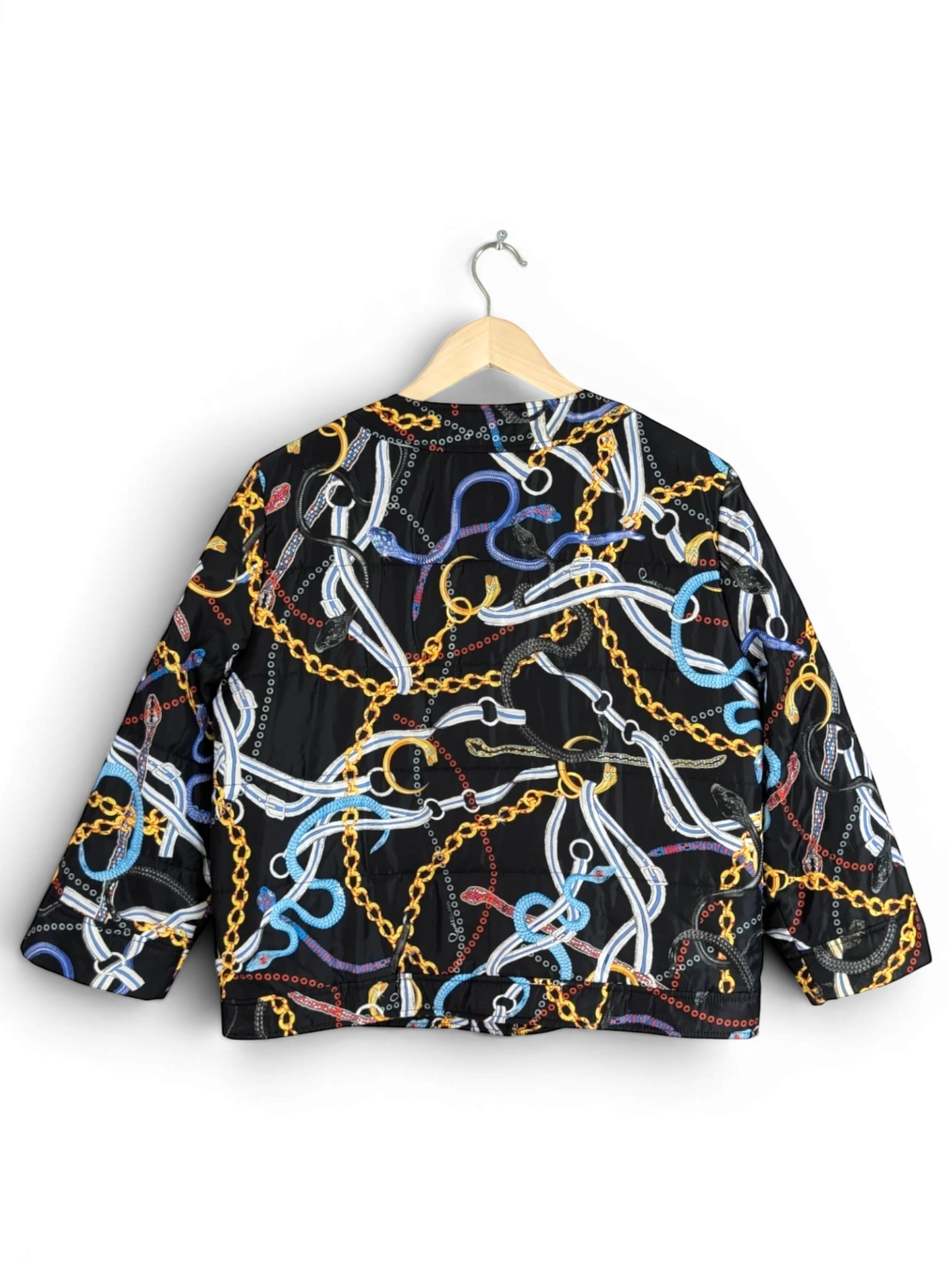 JAKE & IPI black cropped jacket with gold chains and multicolour snake print, quilted construction.