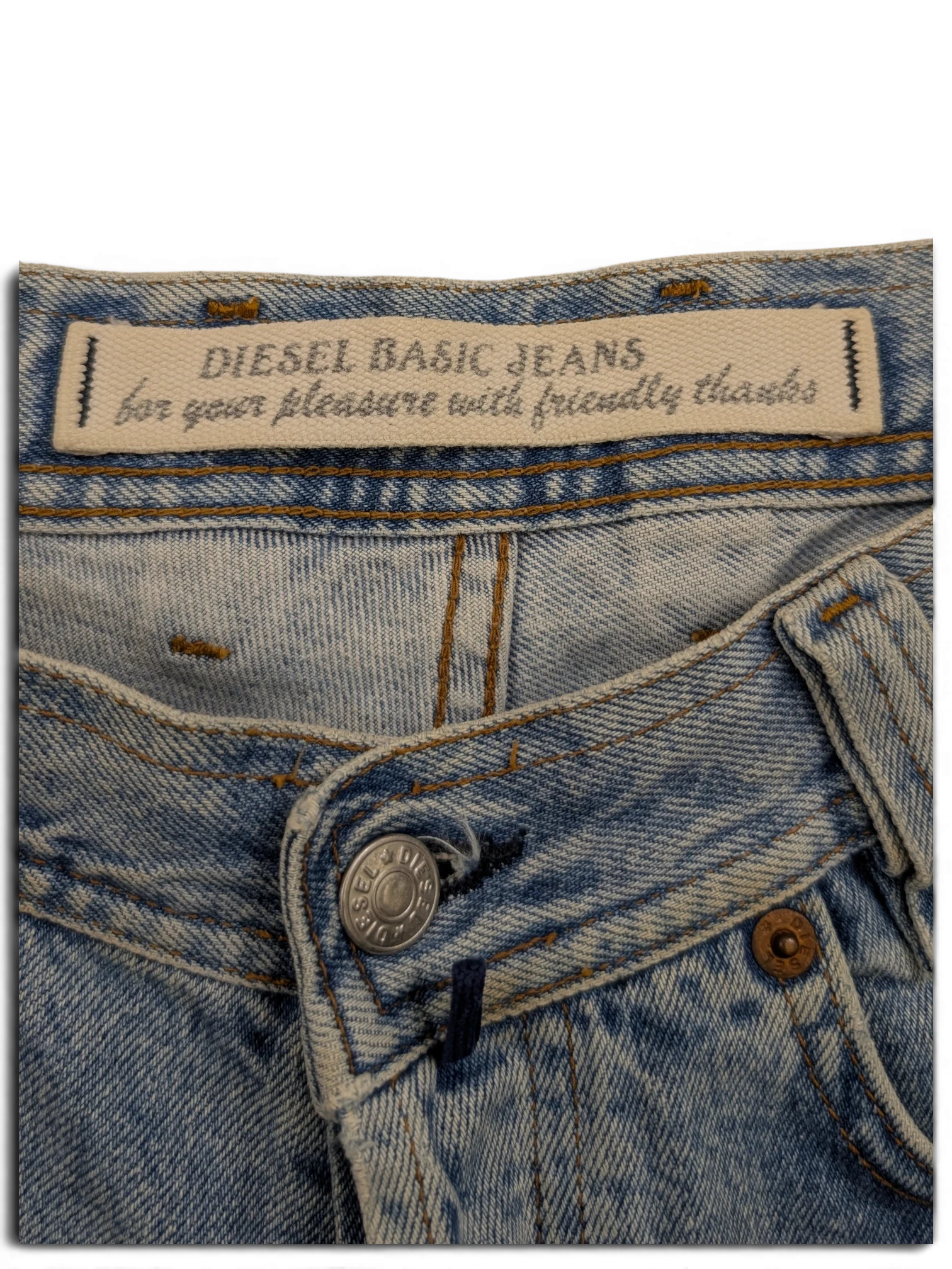 JAKE & IPI Diesel Basic Jeans in light wash denim with button fly and branded tag.