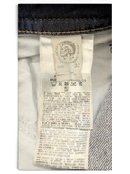 JAKE & IPI Diesel Buster jeans size 32, dark wash denim with care instructions and brand logo.