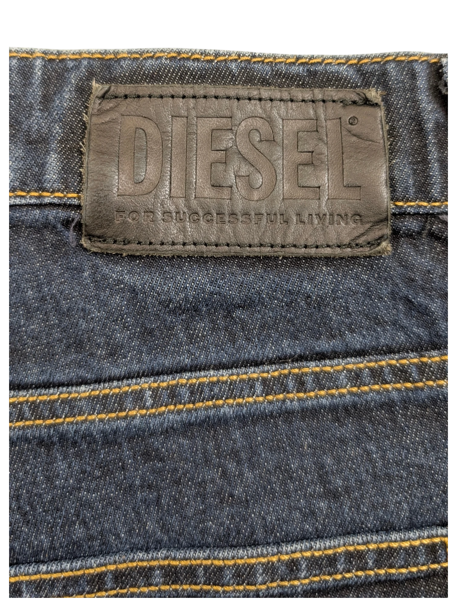 JAKE & IPI Diesel D-Fining dark wash denim jeans with leather logo patch and contrast stitching.