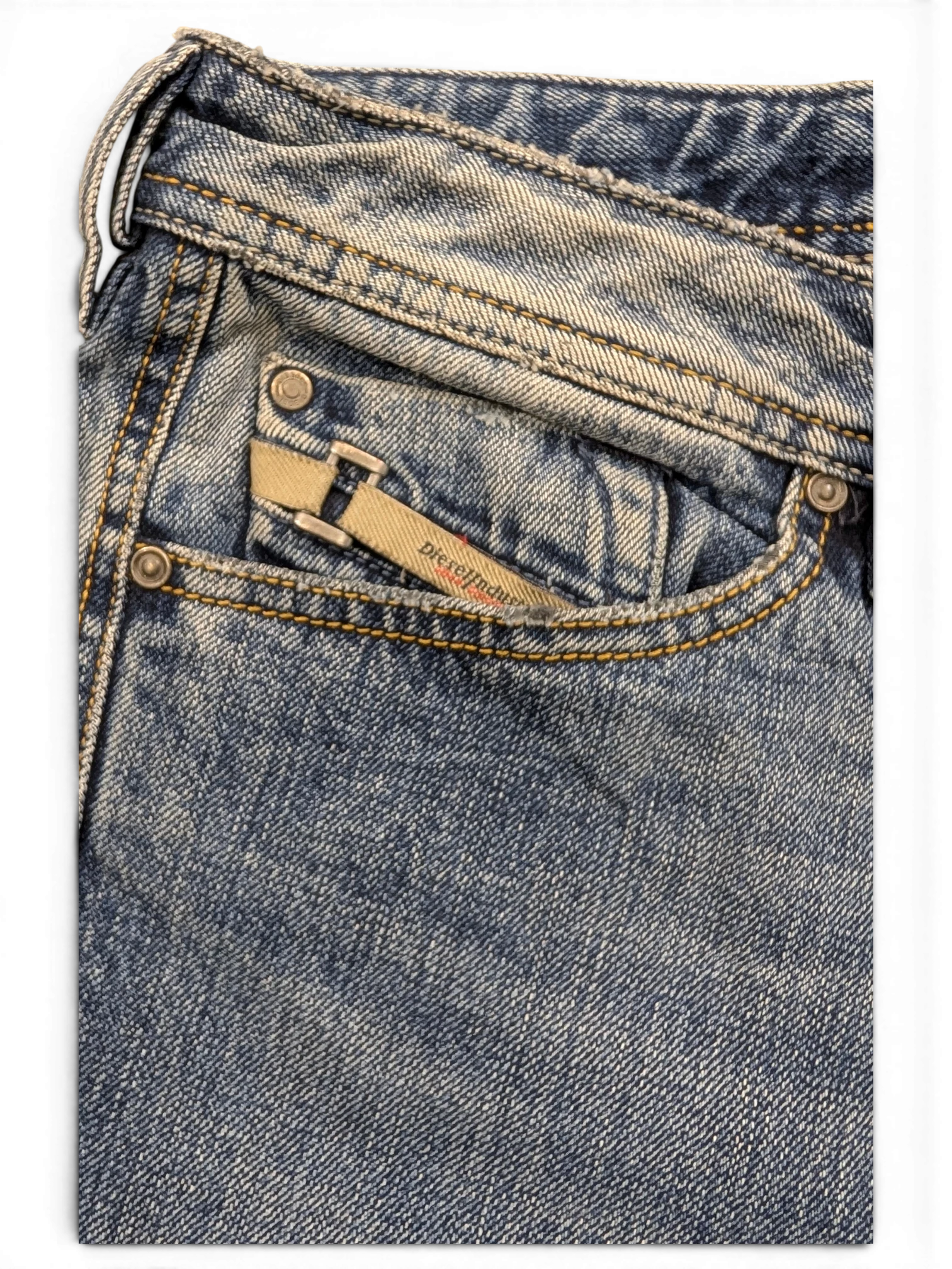 JAKE & IPI Diesel Dughan blue denim jeans with a small pocket tag.