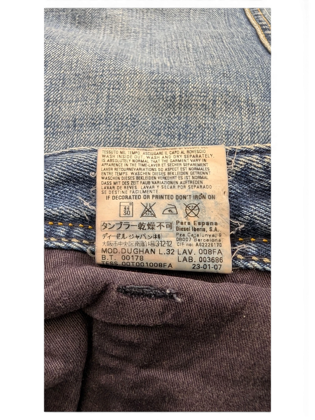 JAKE & IPI Diesel Dughan W29 L32 light wash denim jeans with care label details.