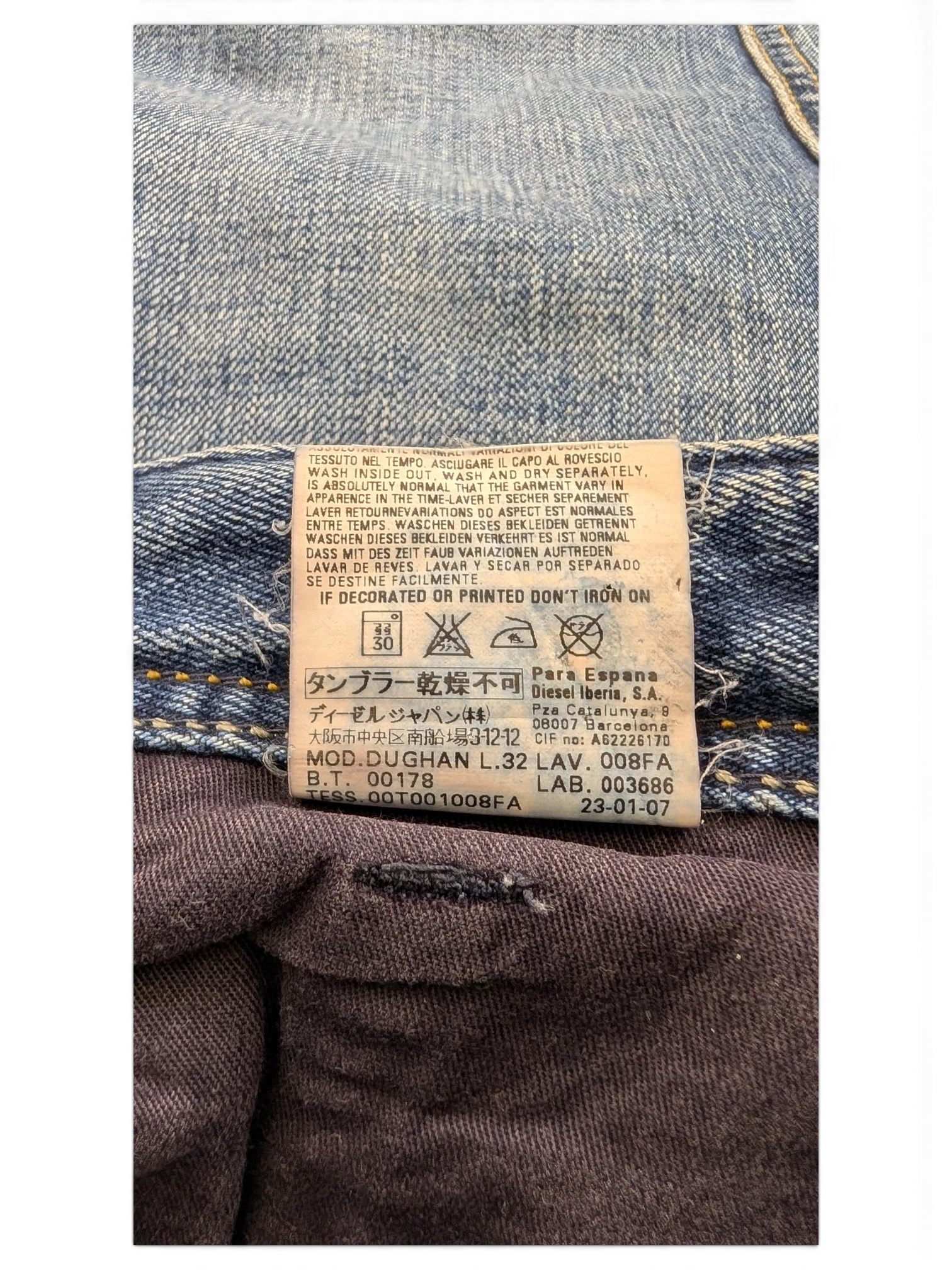 JAKE & IPI Diesel Dughan W29 L32 light wash denim jeans with care label details.