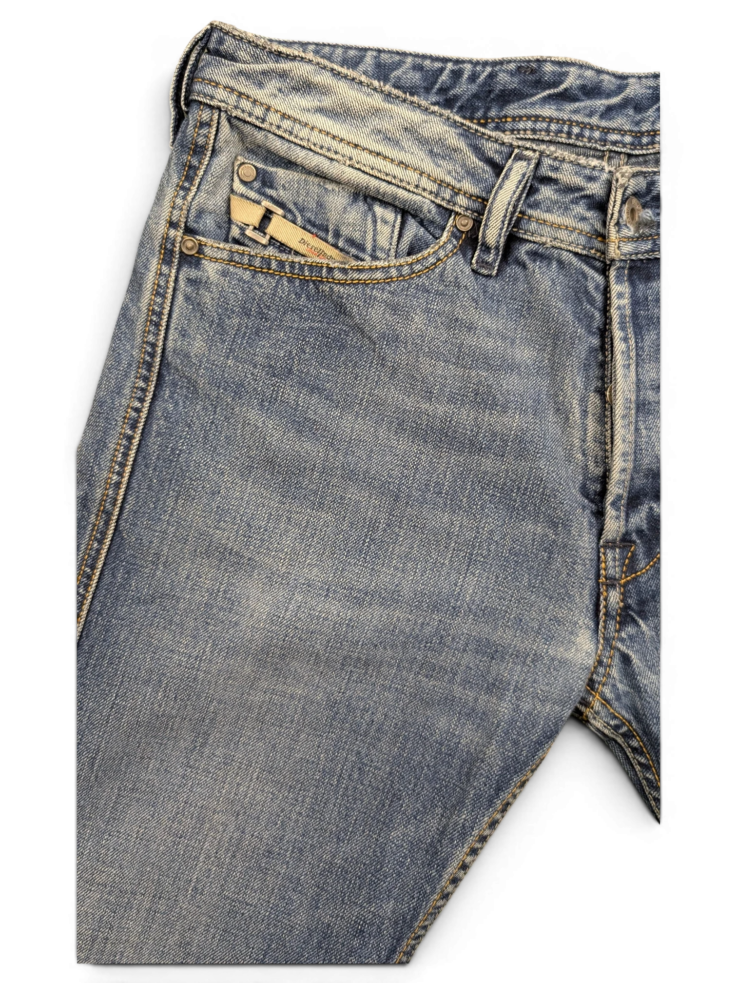 JAKE & IPI Diesel Dughan light wash blue denim jeans with distressed details and coin pocket.