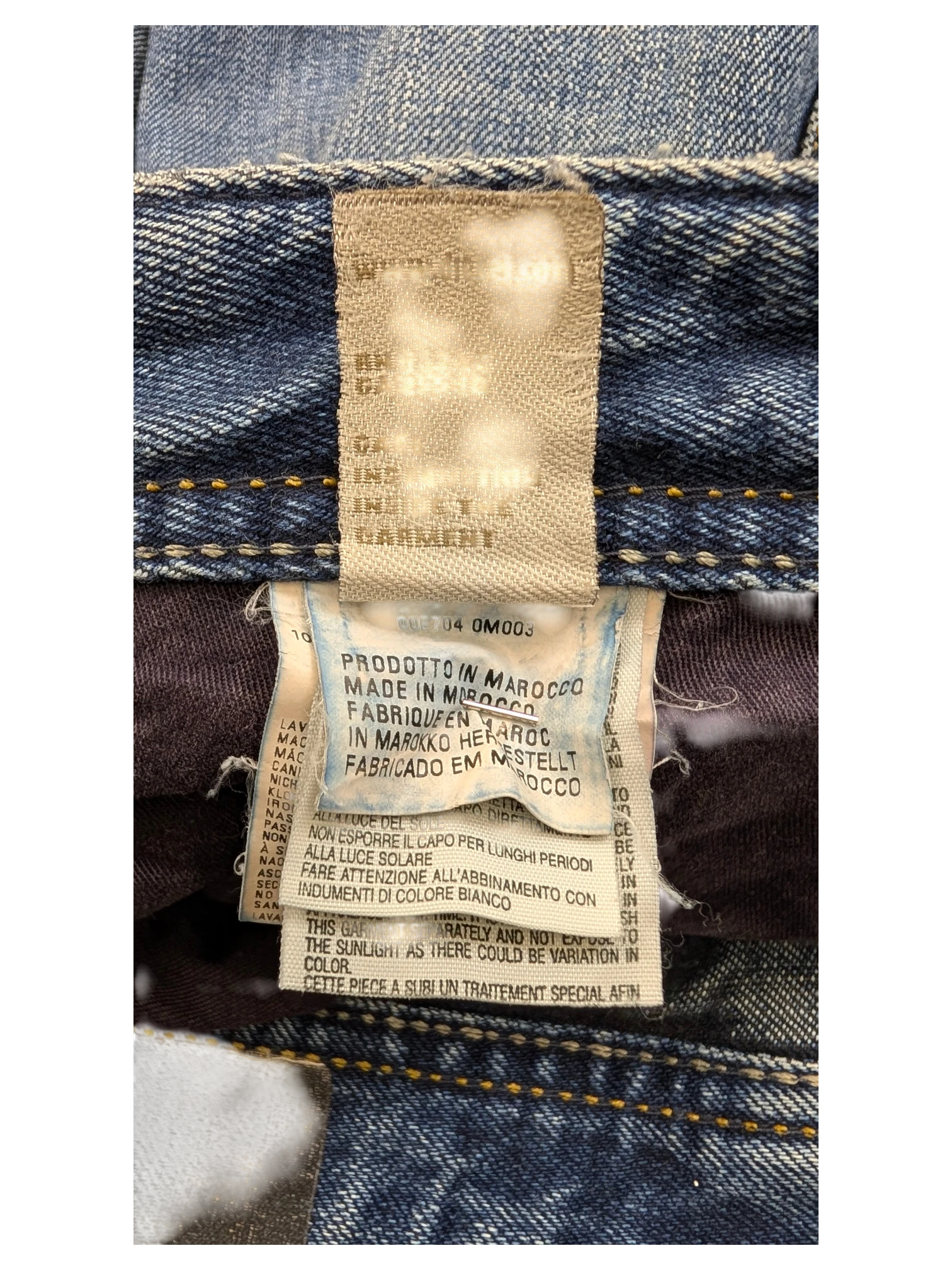 JAKE & IPI Diesel Dughan W29 L32 blue denim jeans with care instructions and origin label.