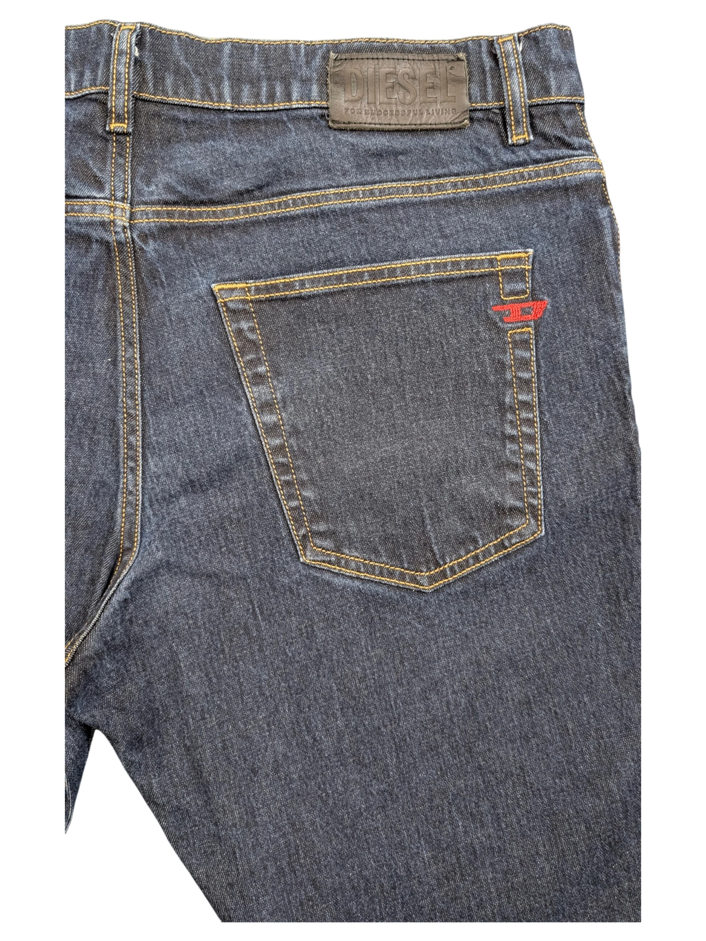 JAKE & IPI dark wash denim jeans with red Diesel logo detail on back pocket and leather brand patch.