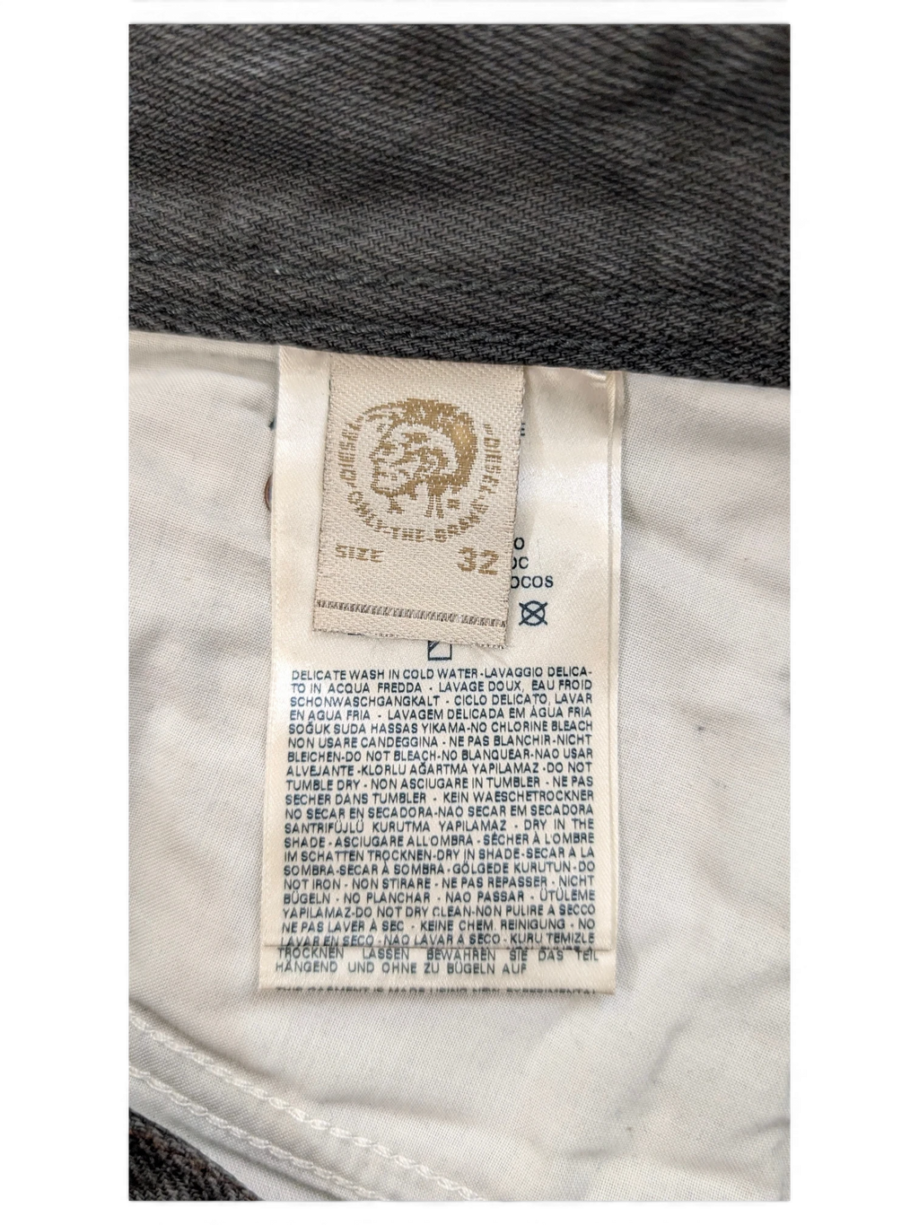 JAKE & IPI Diesel jeans size 32 with care instructions label.