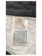 JAKE & IPI Diesel jeans size 32 with care instructions label.
