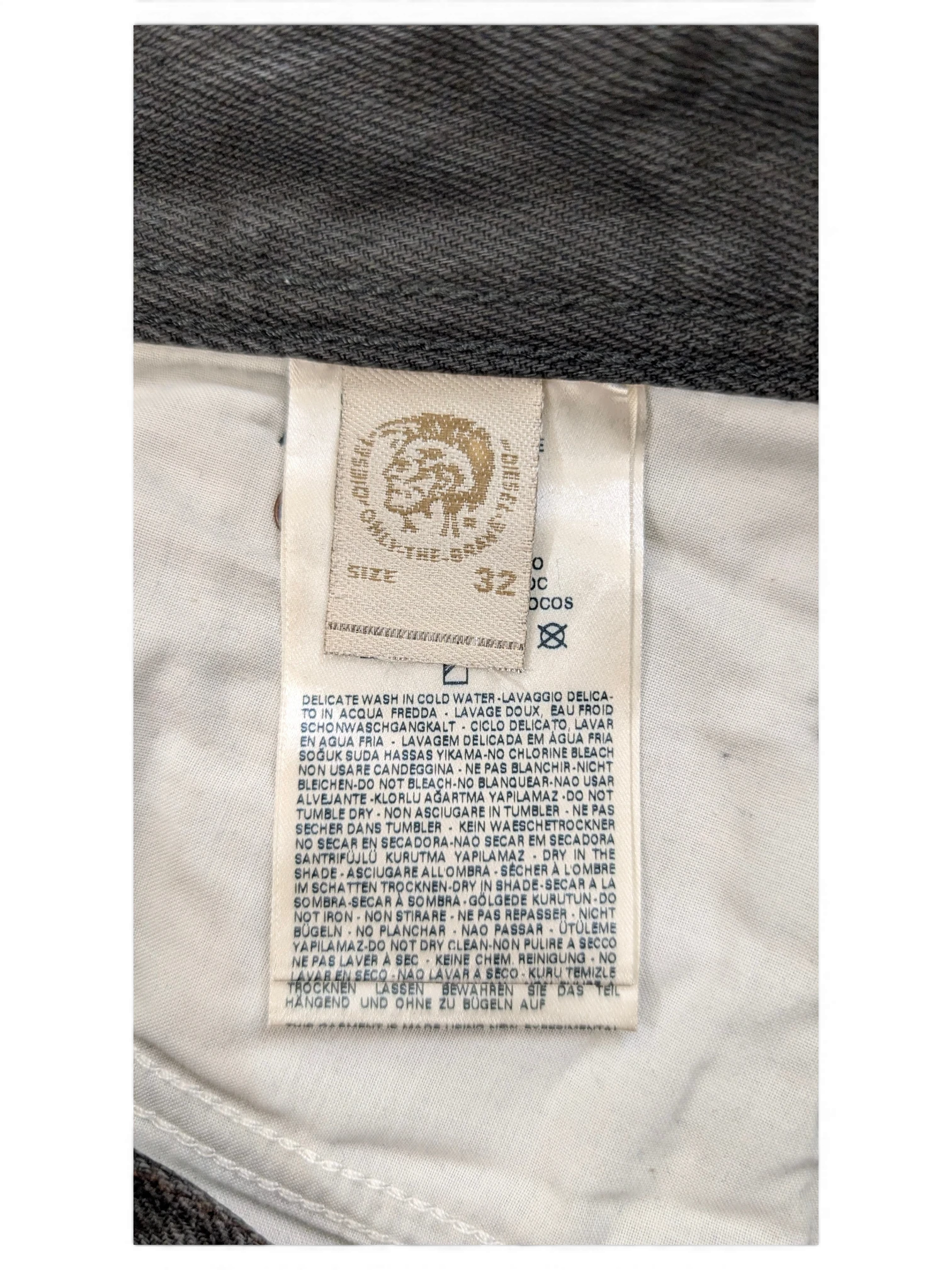 JAKE & IPI Diesel jeans size 32 with care instructions label.
